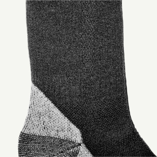 Pustesone på svarte merinoull sokker